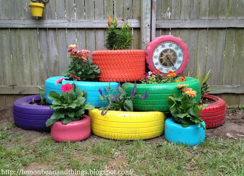 Tyres used horizontally. Image source: http://www.countryliving.com/gardening/garden-ideas/g2286/10-upcycled-items-that-can-be-repurposed-into-diy-planters/